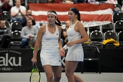 Latvian lady tennis players beat Russia to advance to Fed Cup World Group Latvian lady tennis players beat Russia to advance to Fed Cup World Group