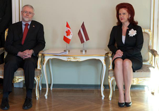 Scott Heatherington and Solvita Aboltina. Riga, 16.02.2011. Photo: saeima.lv