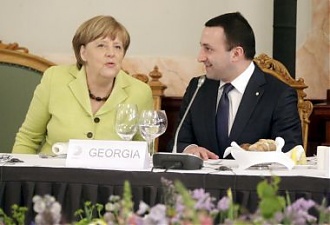 Ангела Меркель и Ираклий Гарибашвили. Рига, 21.05.2015. Фото: president.lv