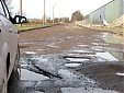 Содержатели дорог в Латвии должны возмещать водителям убытки от ям