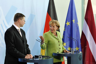 Valdis Dombrovskis and Angela Merkel.