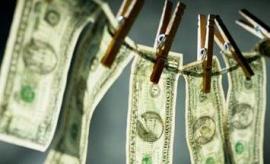 111110_laundering_otmiv_doll.jpg