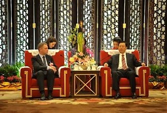 Eligijus Masiulis (left) at ASEM meeting. Photo: sumin.lt